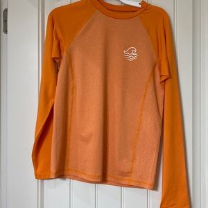 Brand new with tags. Art class swim shirt.